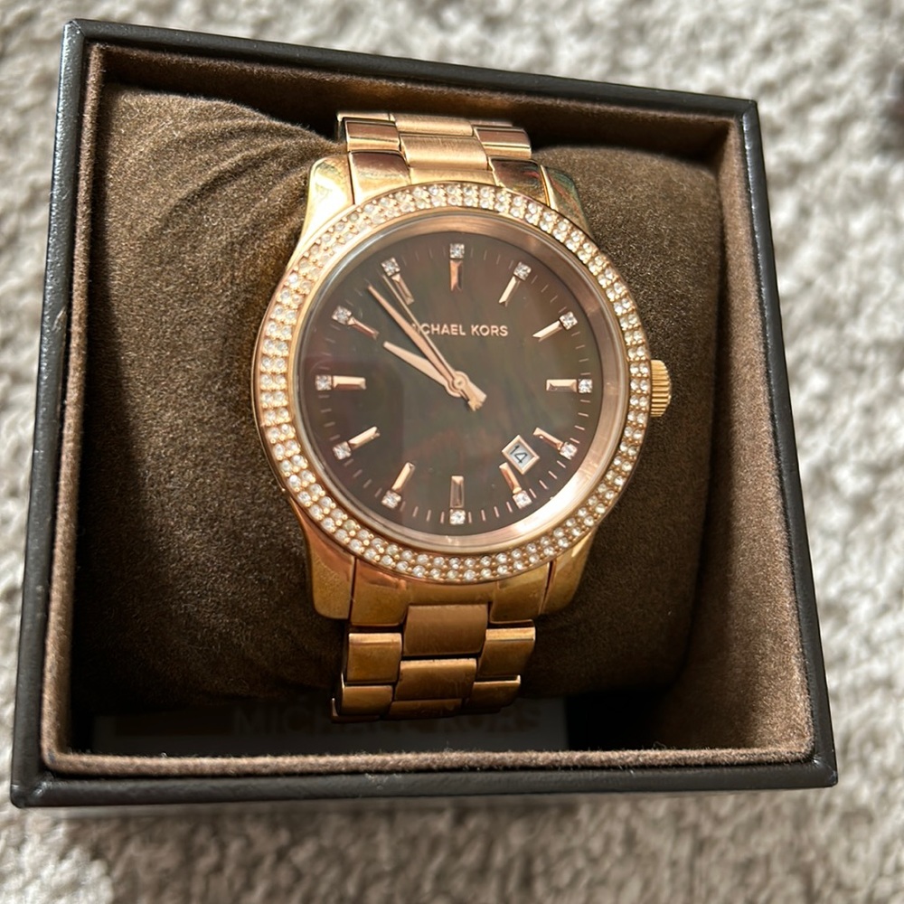 Women’s rose gold Michael kors watch